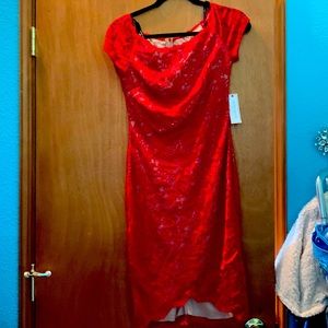 Red scoop neck, knee length form-fitting dress